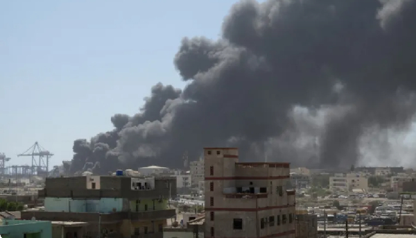 Smoke billows after a drone attack on the port of Port Sudan on May 6, 2025