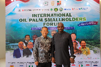 President of the Oil Palm Development Association of Ghana (OPDAG), Paul Amaning (R)