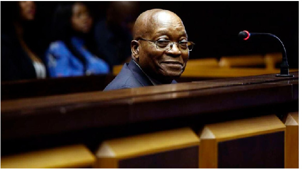 Former South African president Jacob Zuma sits in the dock of the High Court of Pietermaritzburg