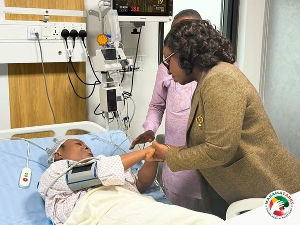 Obuobia Opoku-Darko with the nurse at the hospital