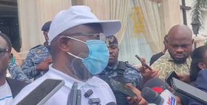 A photo of Joseph Annang adressing the media