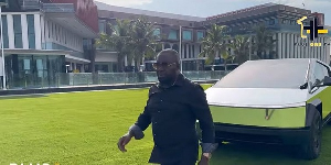 Kwame Despite stepping out of his Tesla Cybertruck