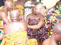 Addai-Nimoh (right) greets the Asantehene