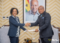 Foreign Affairs Minister Samuel Okudzeto Ablakwa (R) and new AfDB Country Manager, Halima H. Hashi