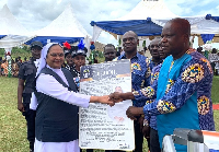 Sister Regenamma Zangiti (L) receiving a citation