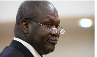 South Sudan's First Vice President Riek Machar takes the oath of office at the State House in Juba