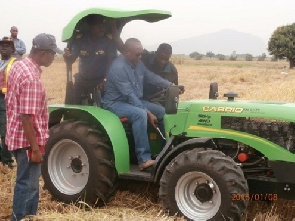 File photo of former President Mahama driving a tractor
