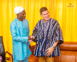 Northern Regional Minister, Ali Adolf [L], and World Bank's  Robin Mearns