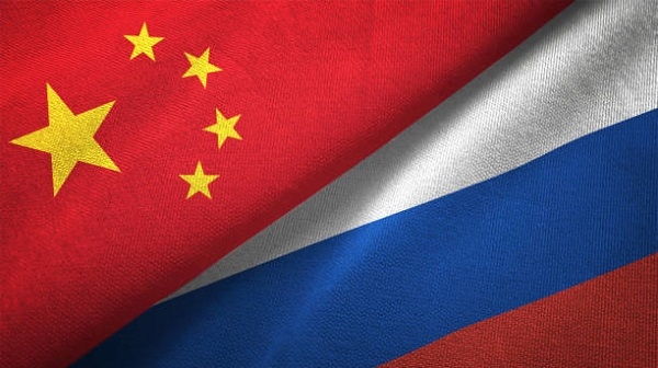 A photo of China, Russia flags