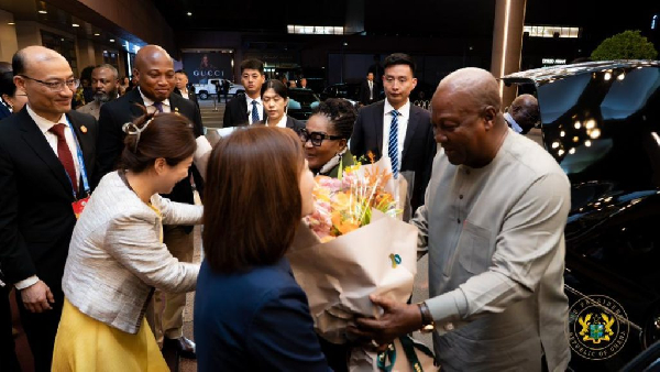President Mahama and his First Lady Lordina Mahama being received by Chinese officials