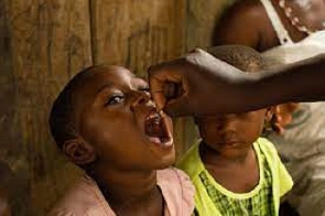 A child receiving a polio vaccine
