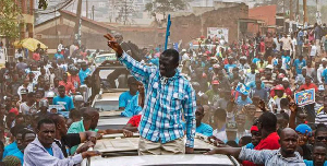 Kizza Besigye, Uganda's leading opposition leader  flashes the V for victory