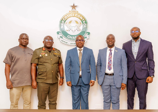 Minister Seidu Issifu (M) with Brig Gen Martey (2nd L) and other dignitaries at the meeting