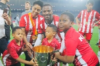 Olanrewaju Kayode with his wife and kids