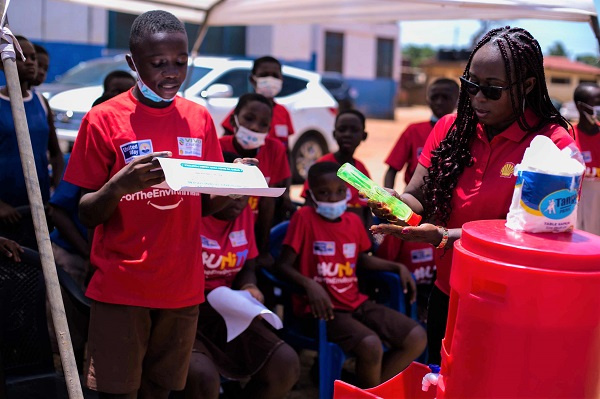 The Corporate Communications Manager of Vivo Energy Ghana, Shirley Tony Kum demonstrating