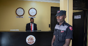 A security guard at the Hope Hostel, one of the locations to house some of the asylum seekers