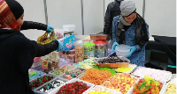 Women preparing food during the 2018 event
