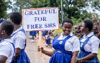 A student seen holding a placard expressing her gratitude for Free SHS