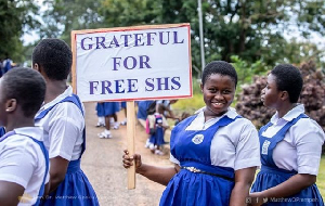 A student seen holding a placard expressing her gratitude for Free SHS