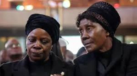 The former president's widow (L) Esther Lungu, and family are fighting over his burial arrangements