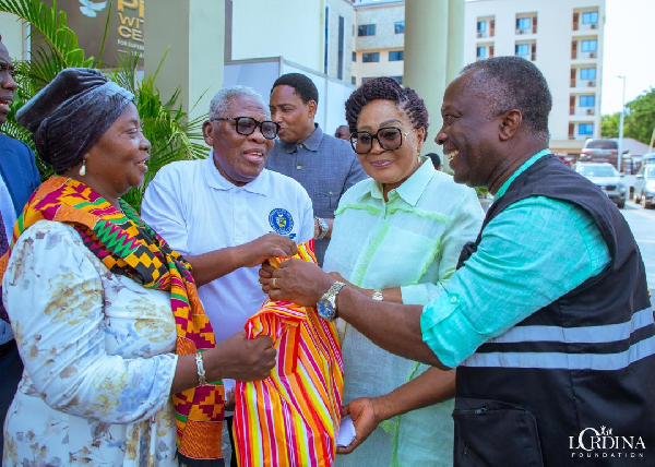Lordina Mahama presenting hampers to retired pastors and widows