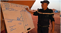 A civil protection officer describes an ongoing rescue operation for Ayoub, a 10-year-old boy