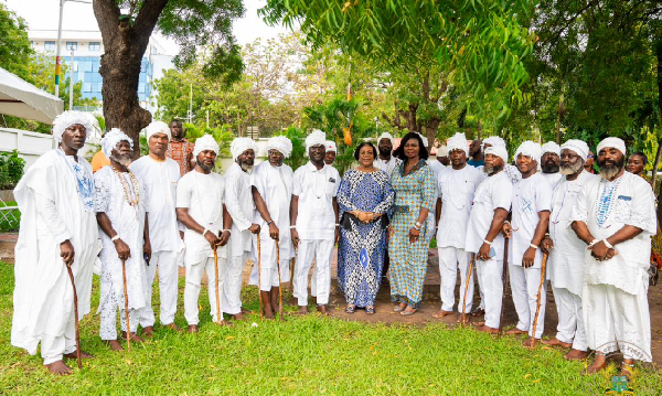 Mrs Rebecca Akufo-Addo in the company of some priests