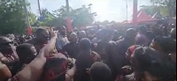 Dr. Bawumia and his entourage in the midst of a crowd at Berekum