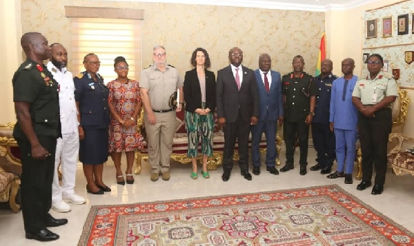 Dr Omene Boamah in a group photograph with the diplomats