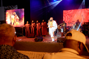 Trigmatic [in white] performing with his backing vocalists at 3rd Osagyefo Night