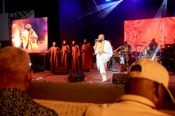 Trigmatic [in white] performing with his backing vocalists at 3rd Osagyefo Night