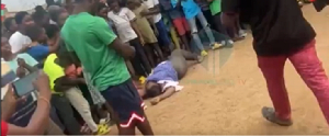 Watch as woman rolls on the floor to report Akufo-Addo to John Mahama