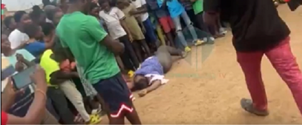 Watch the woman rolling on the ground to report Akufo-Addo to John Mahama