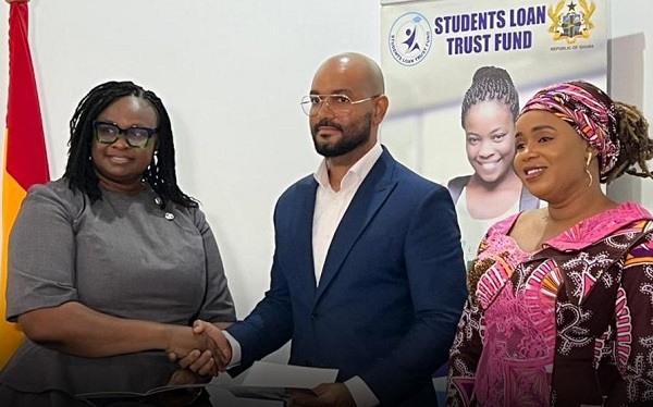 Officials of the Students Loan Trust Fund and AccessPlus at the signing of the MoU