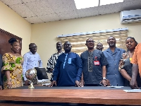 GJA President Albert Dwumfour (fourth left) with some dignitaries at the Press Center