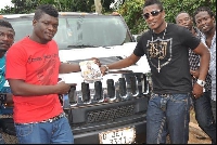 A photo of Asamoah Gyan and Castro