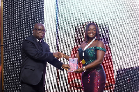 Barbara Addo Ackonor receiving her award