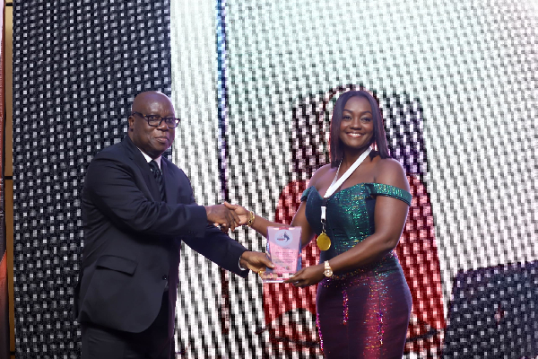 Barbara Addo Ackonor receiving her award