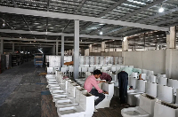 A worker seen inside a ceramics factory in Morbi, Gujarat, India