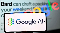 The Google Bard web page is seen on screen with Google AI on mobile