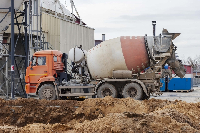 Photo of a concrete mixer truck