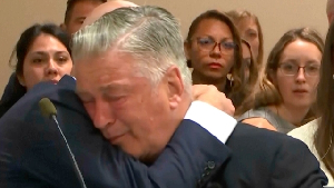 Alec Baldwin reacts after the judge threw out the involuntary manslaughter case. Pic: AP