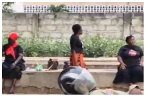 Some relatives of the late immigration officer at the court premises