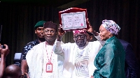 Nigeria's President-elect Bola Tinubu after receiving his election certificate from INEC
