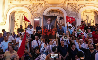 Protesters chant against President Kais Saied, in Tunis, Tunisia, August 20, 2026