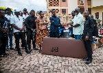 Ernest Yaw Anim presenting the items