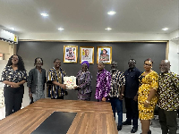 Dzifa Gomashie with representatives from the Writers Project of Ghana