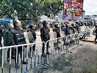 Armed police at post