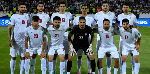Irans's players pose for a team photo before an Asian group A qualifying soccer
