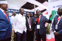 President Ruto (in white) with Dr Siaw Agyepong (holding the microphone) with other stakeholders